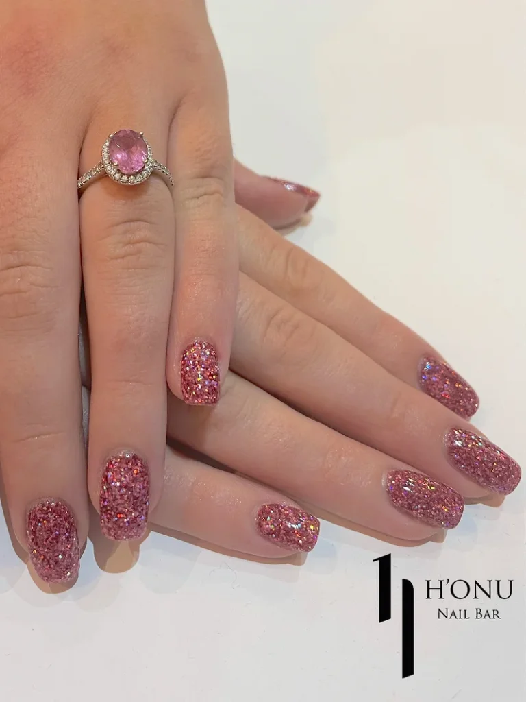 pink glitter nails gel manicure design with sparkly finish at honu nails