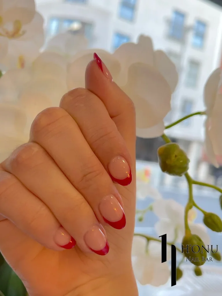 minimal red french tip nails with clean gel manicure at honu nails