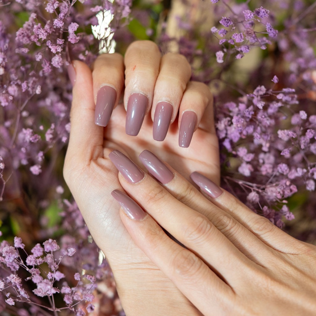 Mauve nude gel nails at H’ONU with glossy finish and clean square shape for an elegant natural look