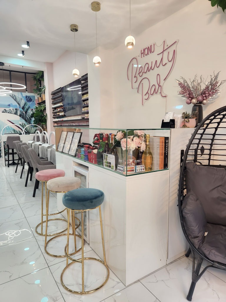 Luxury nail experience in Hoxton London with complimentary drinks and stylish beauty bar setting