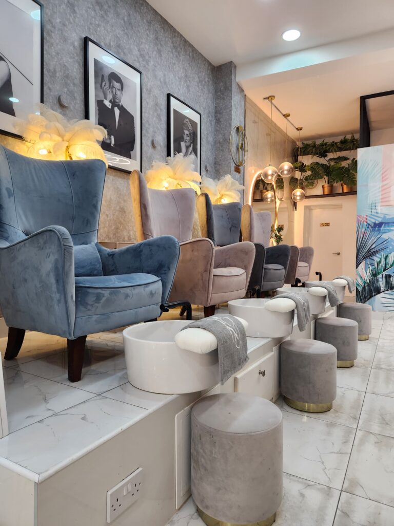 Luxury nail salon in Hoxton London with elegant pedicure chairs and premium beauty bar atmosphere