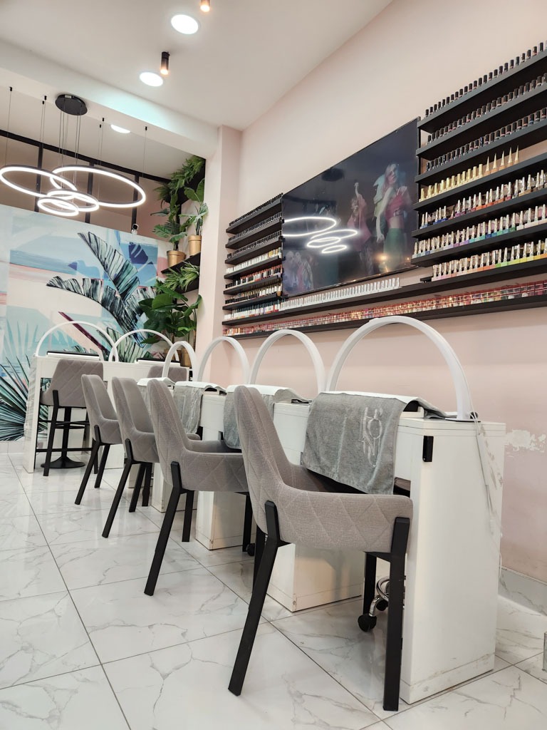 Professional manicure service in Hoxton London with modern nail stations and precise nail care setup