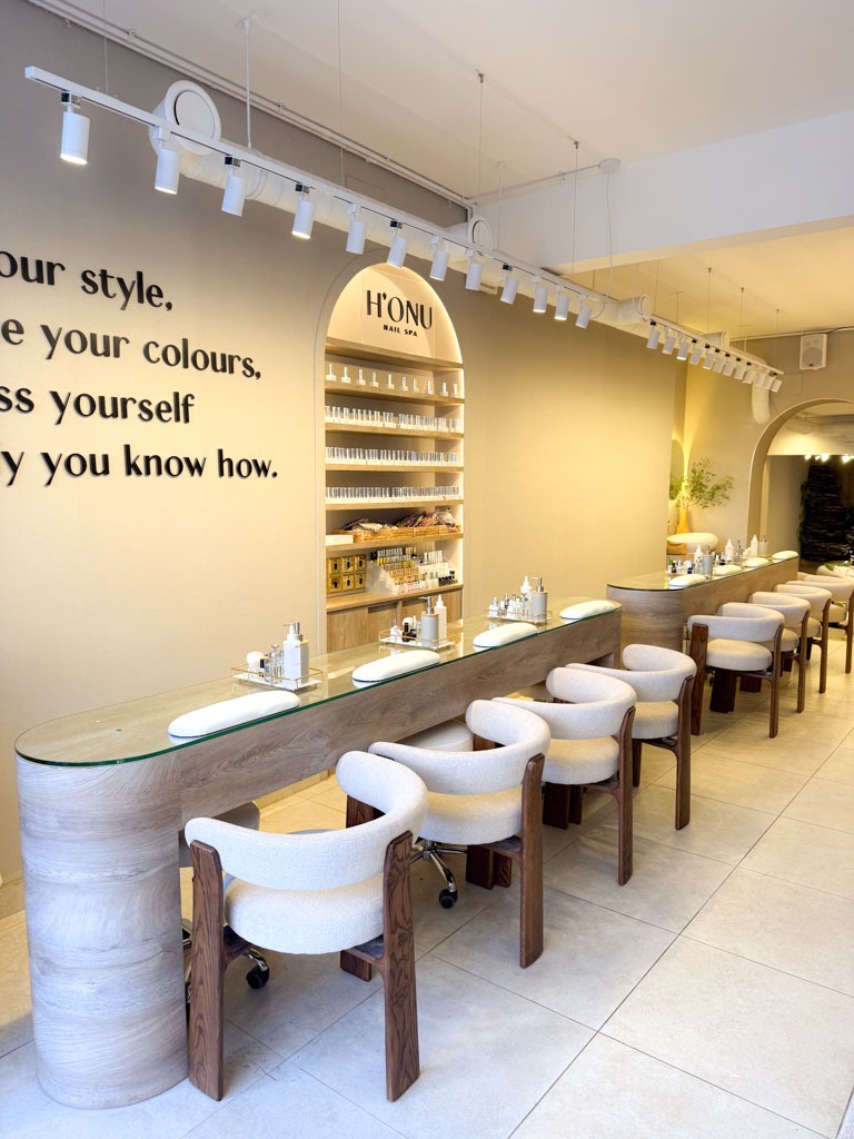 Bespoke nail art in Hampstead London with elegant manicure stations and refined luxury spa design